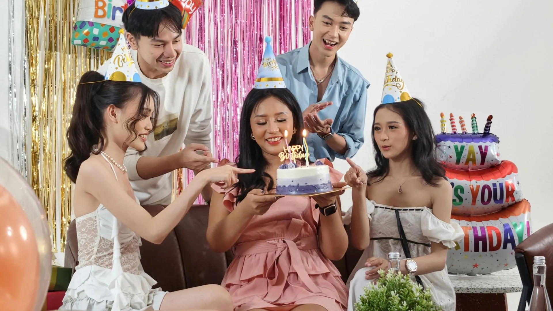 Friends celebrating together at a birthday party