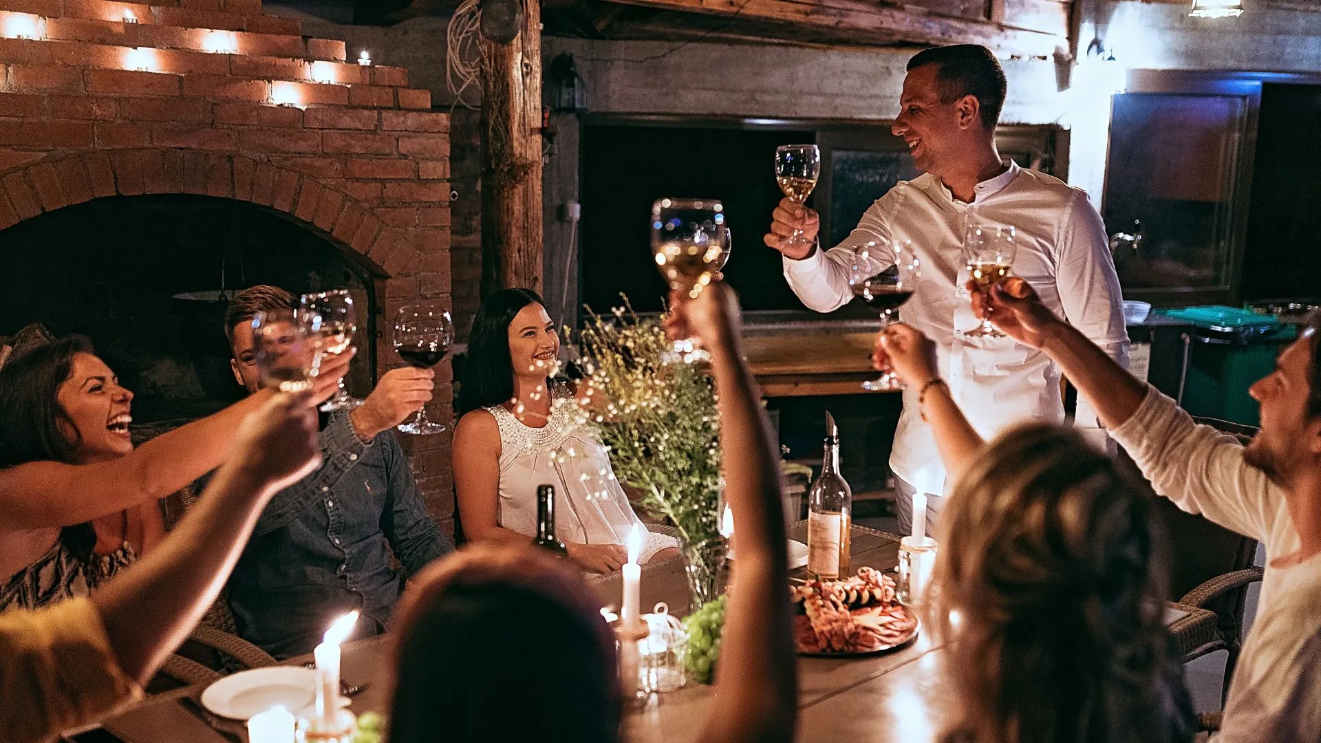 Colleagues raising a toast together at a company holiday party