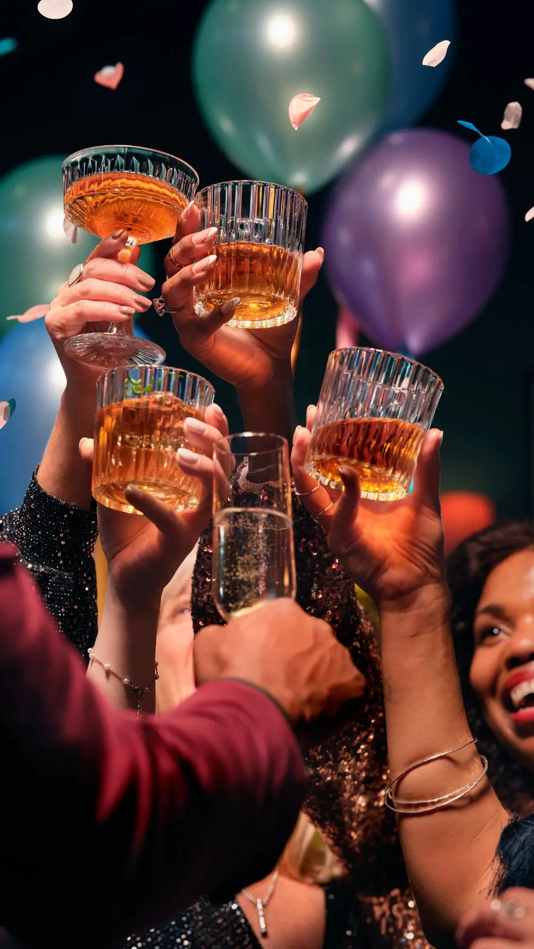 Friends raising their glasses at a celebration